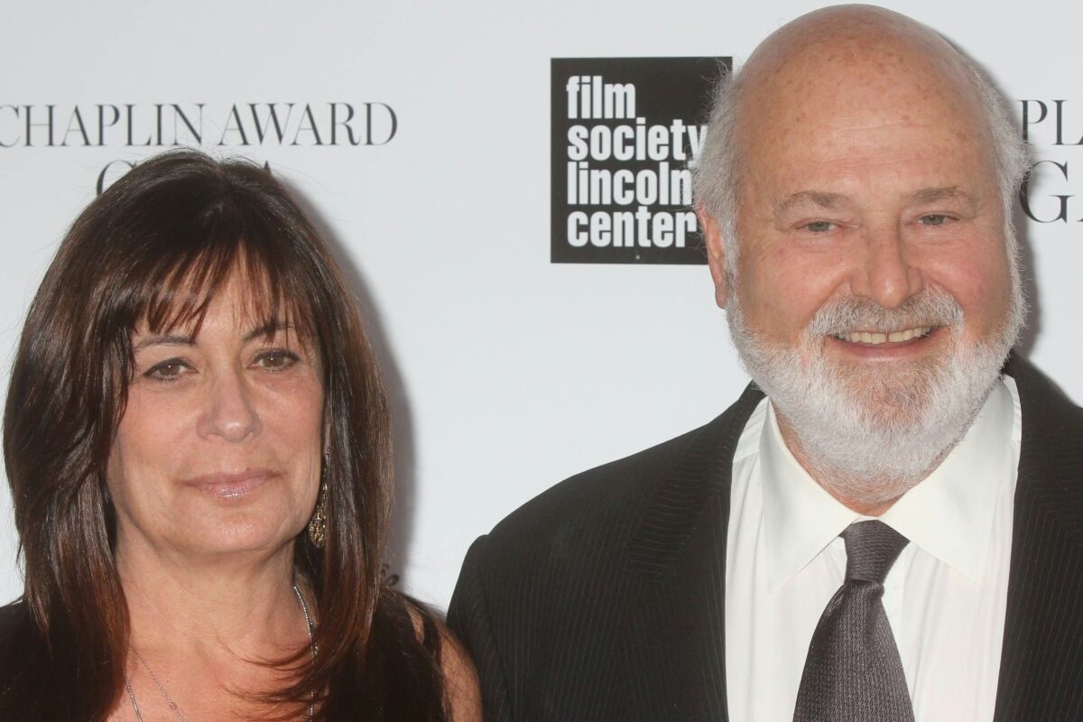 Michelle Singer Reiner and Robert Reiner posing at an event.